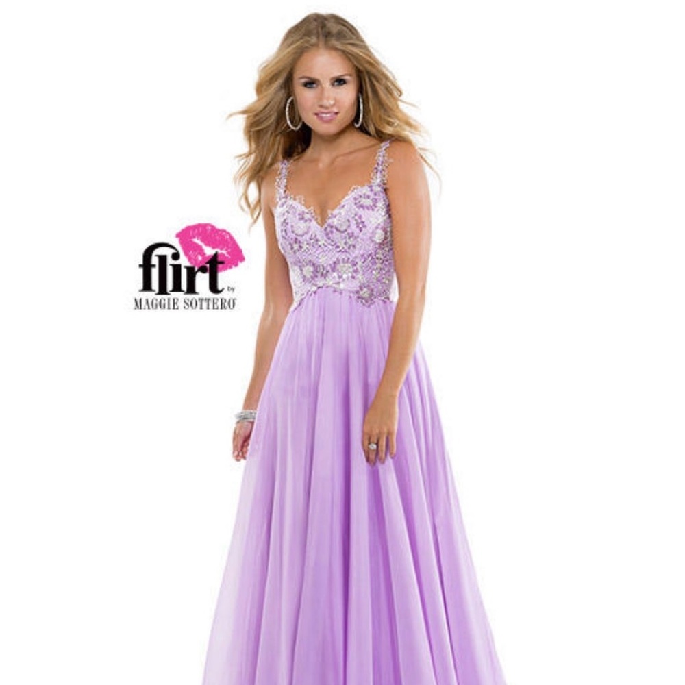 Flirt by Maggie Sottero gorgeous light purple beaded gown